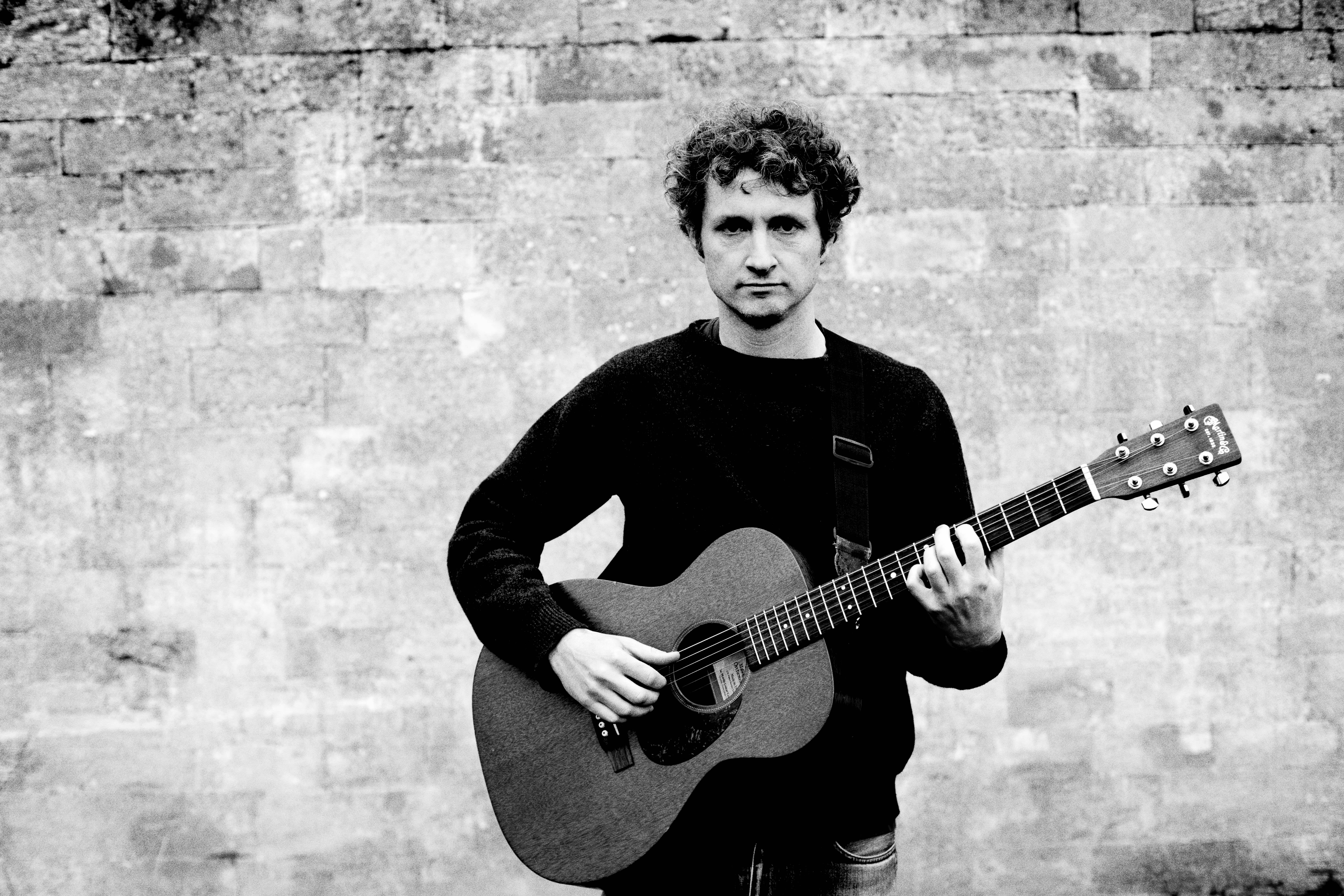 Sam Amidon with guitar